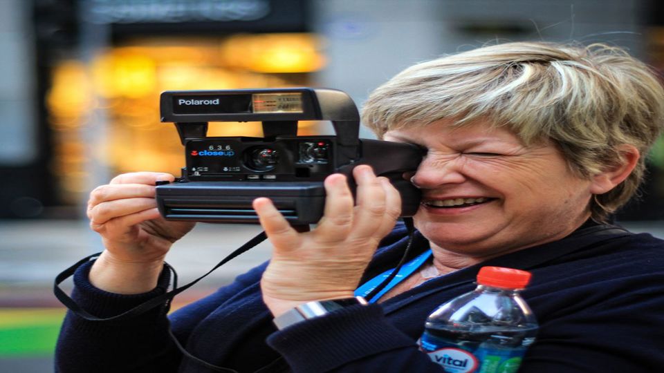 Explorando A Cidade Com Uma Polaroid foto 1